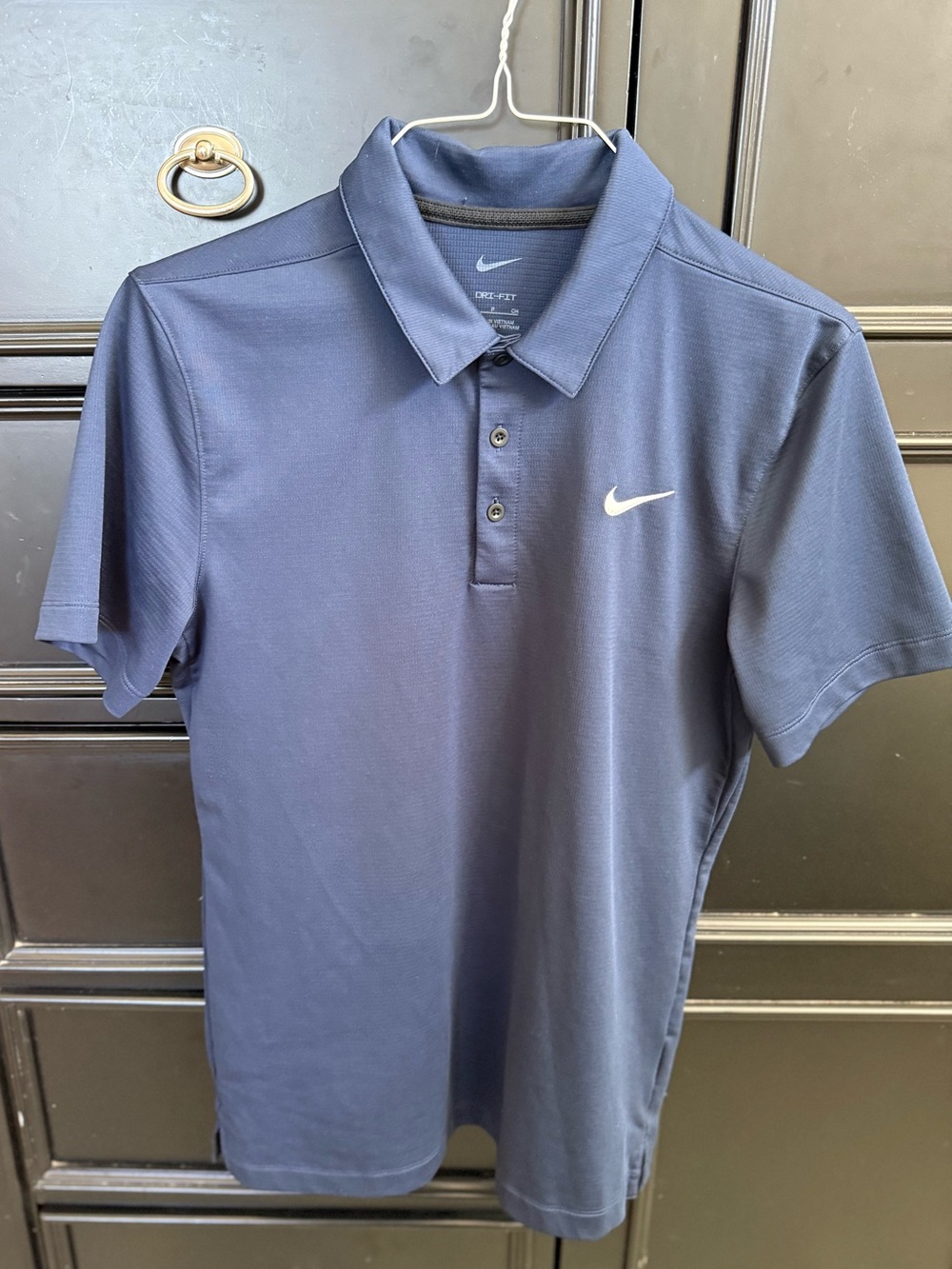 Nike Men’s Navy Blue Polo with White Swoosh